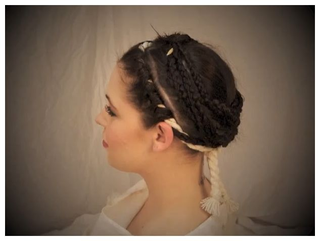 Illustration for article titled Ancient Roman Vestal Virgin hairstyle re-created for very first time